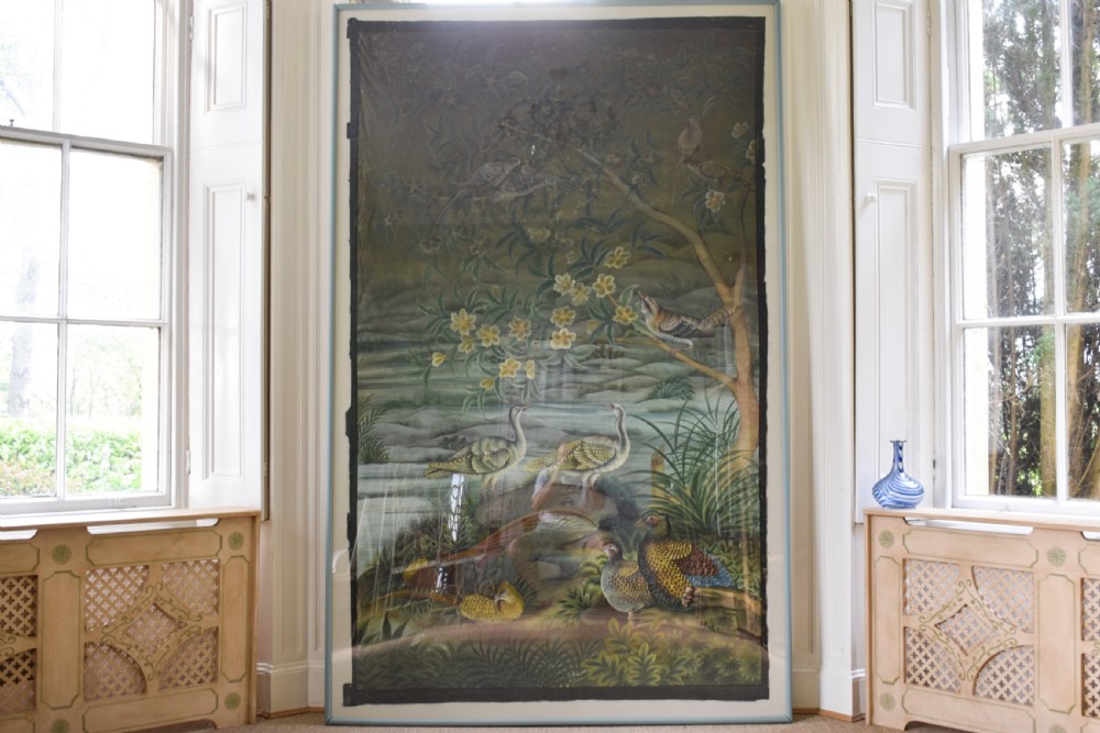 A large nineteenth-century framed Asian wall hanging painted with birds, blooming flowers, and foliage on a muted green background. View II