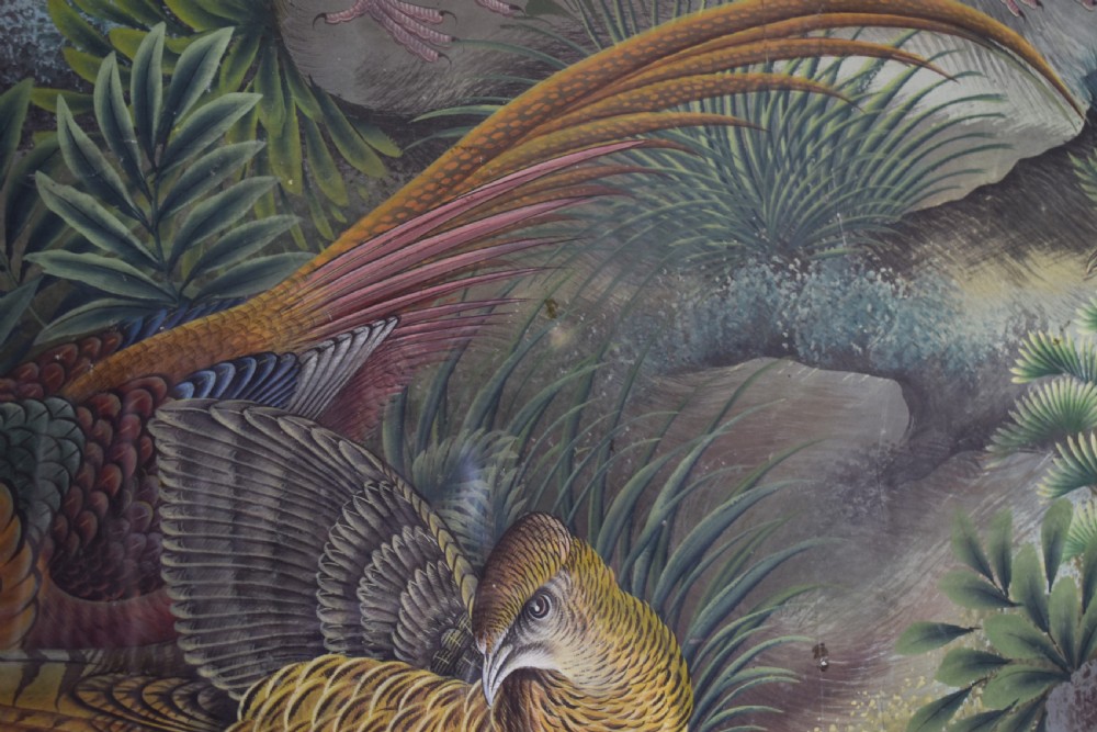 A large nineteenth-century framed Asian wall hanging painted with birds, blooming flowers, and foliage on a muted green background. View V