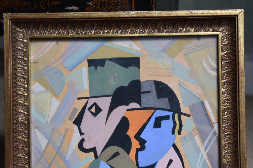 A framed Art Deco watercolour painting depicting stylised geometric human profiles in pastel tones set within a moulded gilt frame. View III