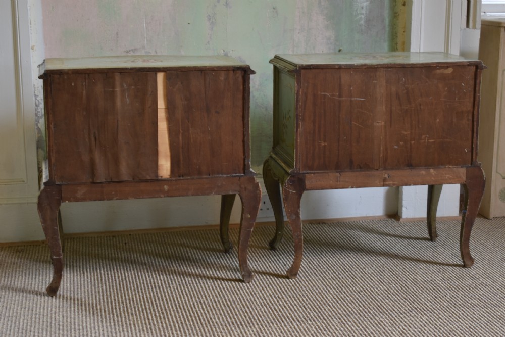A pair of sage green French painted bedside cabinets with floral hand-painting, gilt scroll mouldings, double doors, and cabriole legs. View IX