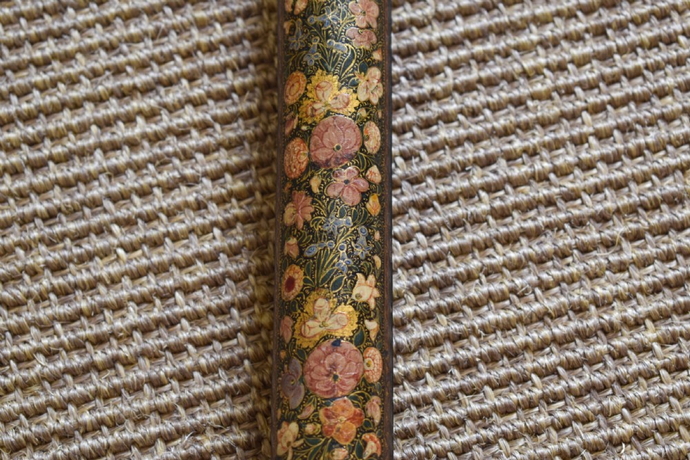 A long-handled Kashmiri fire bellows decorated with hand-painted floral lacquered motifs and a metal nozzle. View IV