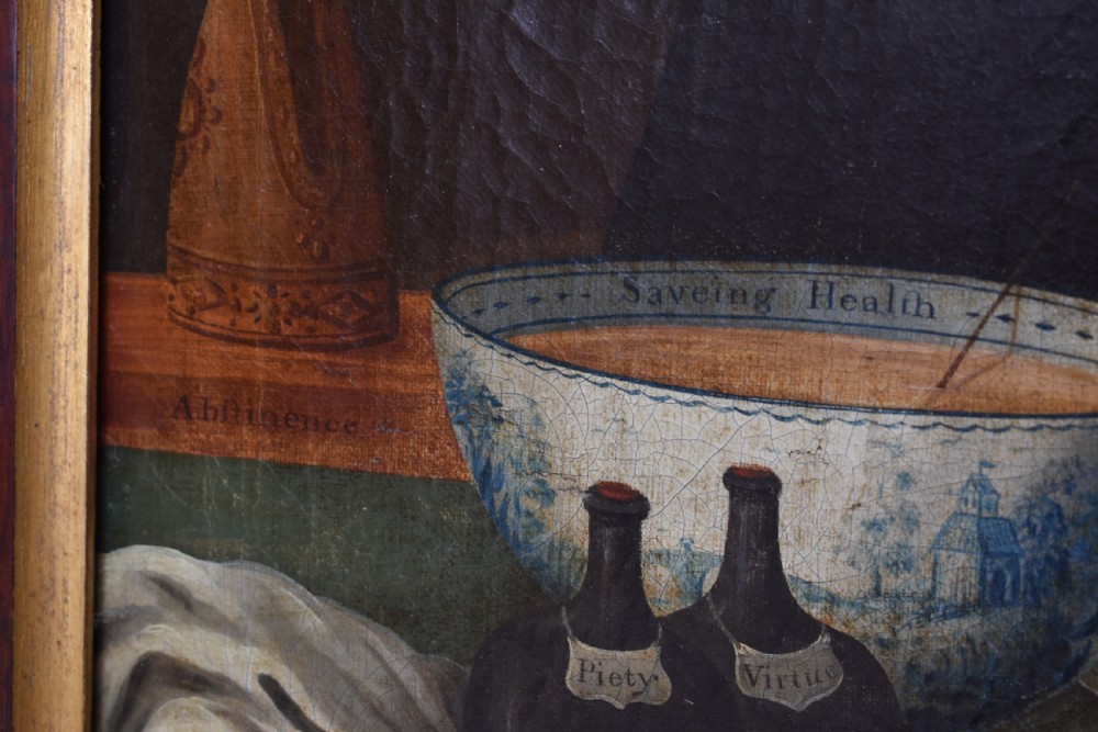 An eighteenth-century oil painting depicting a clergyman seated at a draped table with a punch bowl and glass, encased in a dark wooden frame with a gilded inner slip. View VI