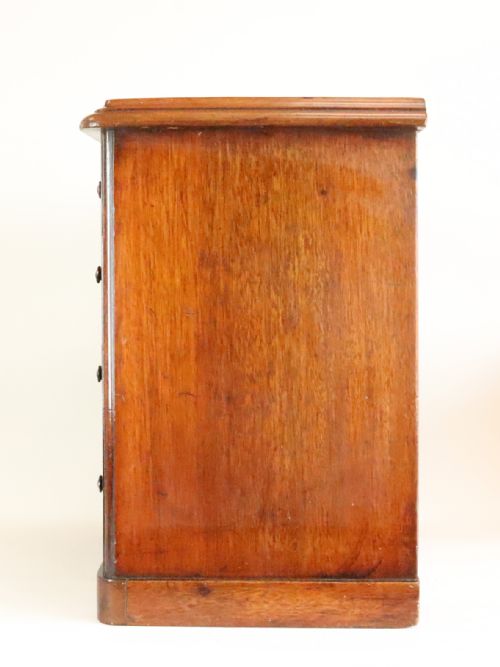 A MINIATURE 19TH CENTURY CHEST OF DRAWERS - ADDITIONAL PHOTO 2
