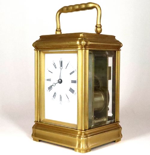 STRIKING CARRIAGE CLOCK IN A GORGE CASE - ADDITIONAL PHOTO 1