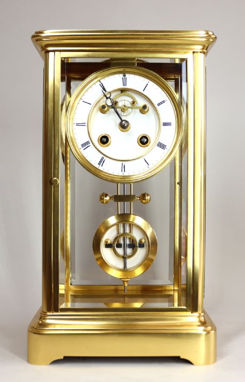 a gilded french four glass clock with visible escapement and ellicot type pendulum - CATEGORY: ANTIQUE CLOCKS - DATED 1870