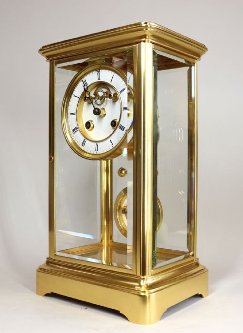 A GILDED FRENCH FOUR GLASS CLOCK WITH VISIBLE ESCAPEMENT AND ELLICOT TYPE PENDULUM - ADDITIONAL PHOTO 1