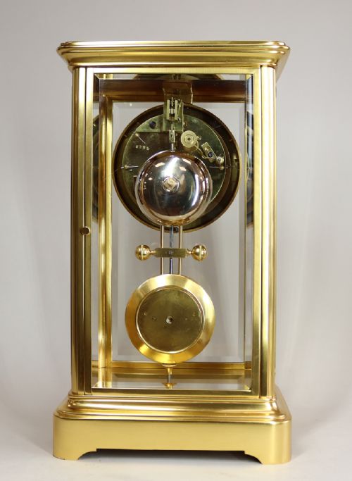 A GILDED FRENCH FOUR GLASS CLOCK WITH VISIBLE ESCAPEMENT AND ELLICOT TYPE PENDULUM - ADDITIONAL PHOTO 3