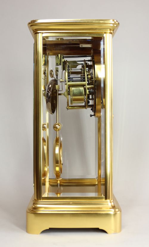 A GILDED FRENCH FOUR GLASS CLOCK WITH VISIBLE ESCAPEMENT AND ELLICOT TYPE PENDULUM - ADDITIONAL PHOTO 4