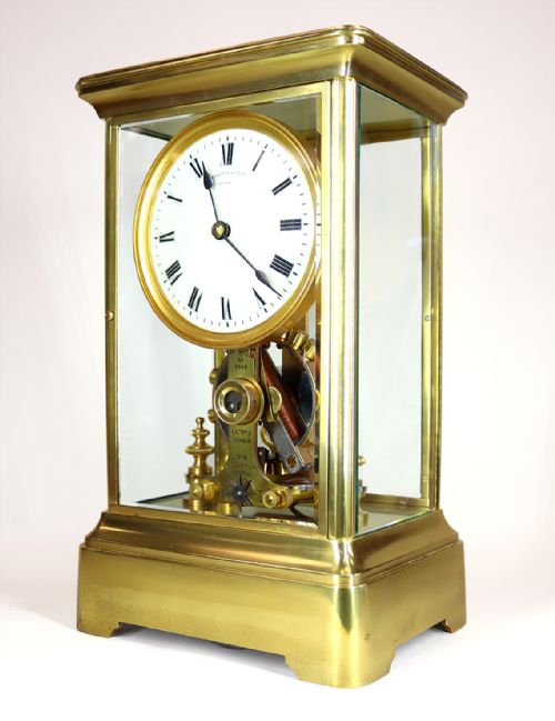 A EUREKA FOUR GLASS ELECTRIC MANTEL CLOCK - ADDITIONAL PHOTO 1