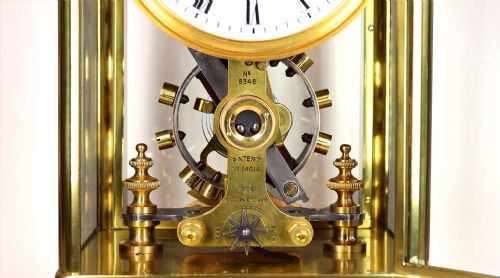 A EUREKA FOUR GLASS ELECTRIC MANTEL CLOCK - ADDITIONAL PHOTO 8