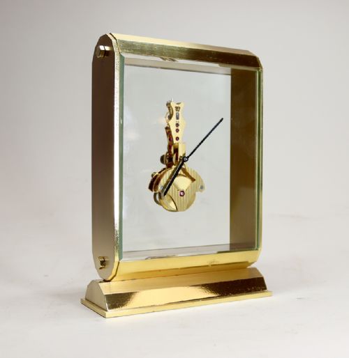 A MIDCENTURY SWISS INLINE SKELETON TIMEPIECE - ADDITIONAL PHOTO 5