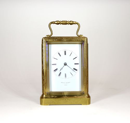 An Engraved One Piece Carriage Clock with a Rare Platform Escapement.