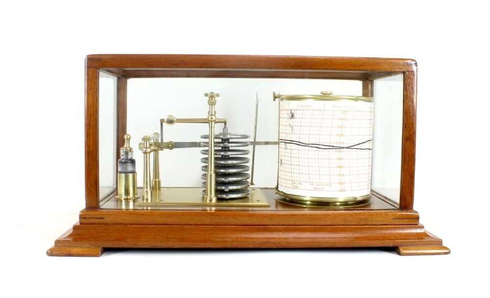 An antique five-glass barograph in a mahogany frame, featuring a brass drum chart mechanism, metal aneroid capsule stack, and glass ink bottle.