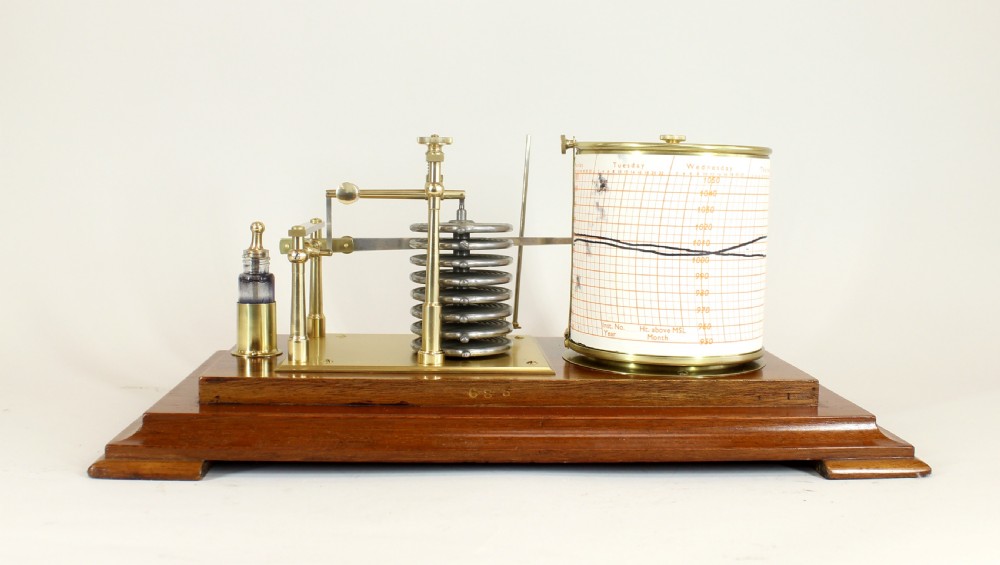 An antique five-glass barograph in a mahogany frame, featuring a brass drum chart mechanism, metal aneroid capsule stack, and glass ink bottle. View II