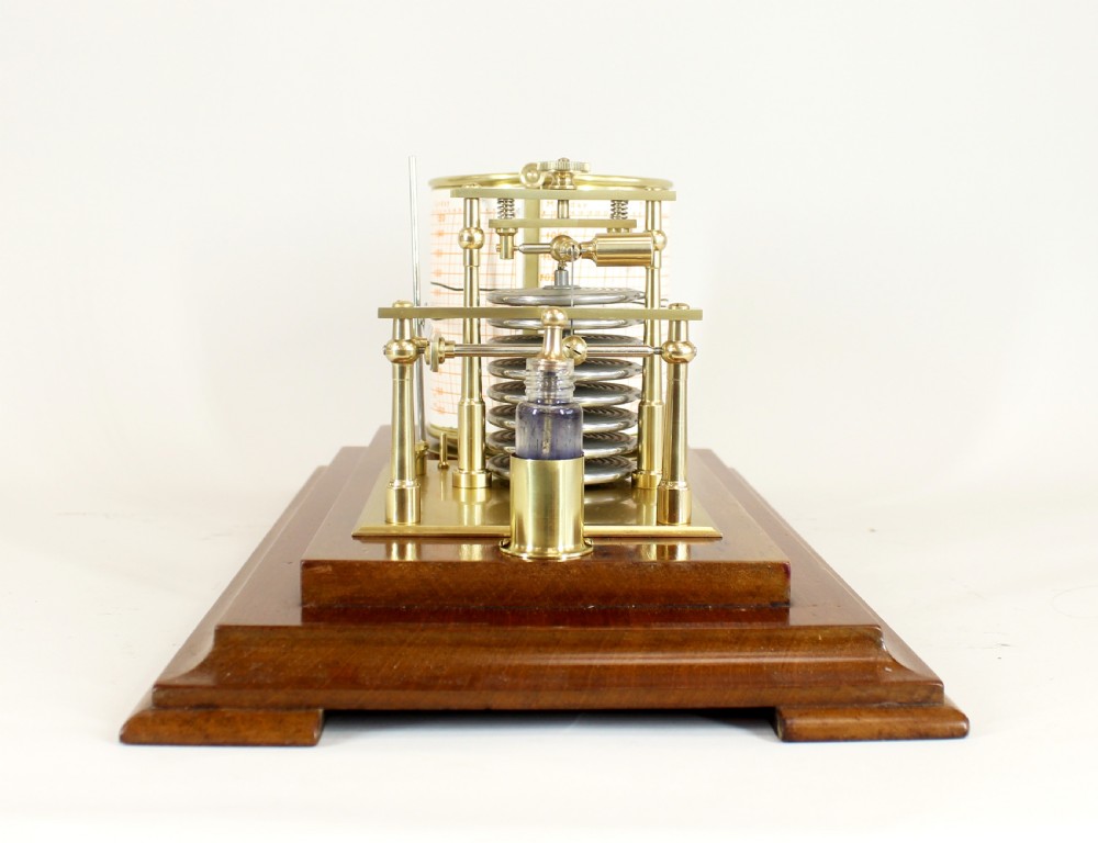 An antique five-glass barograph in a mahogany frame, featuring a brass drum chart mechanism, metal aneroid capsule stack, and glass ink bottle. View VII