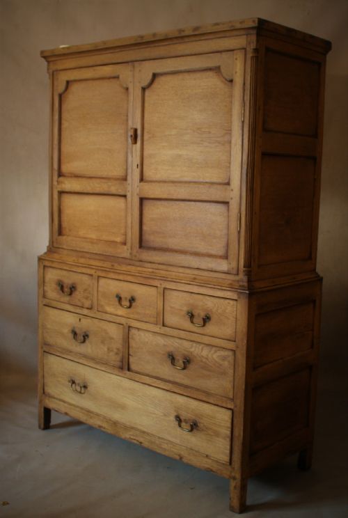 bleached oak panelled cupboard - CATEGORY: ANTIQUE CUPBOARDS - DATED 19TH CENTURY