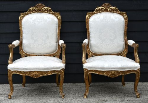 OUTSTANDING PAIR OF FRENCH GILT ARMCHAIRS C1880