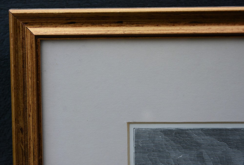 A framed 19th-century monochrome wood engraving depicting Adam and Eve in a dense forest setting, encased in a gilded wooden frame with a wide cream mount. View VII
