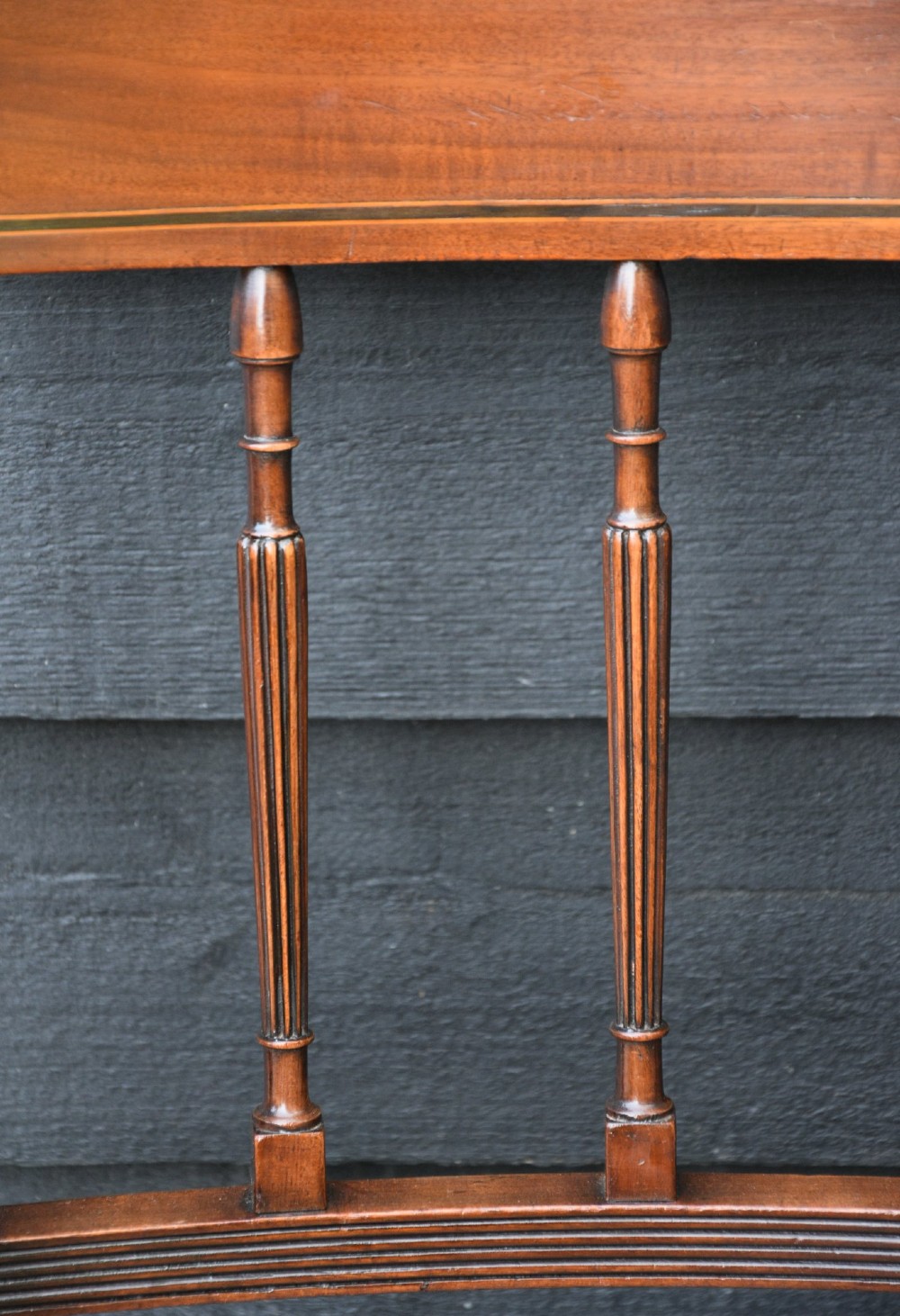 Set of six mahogany Georgian style dining chairs featuring spindle backrests, turned legs, and floral tapestry upholstery. View VIII