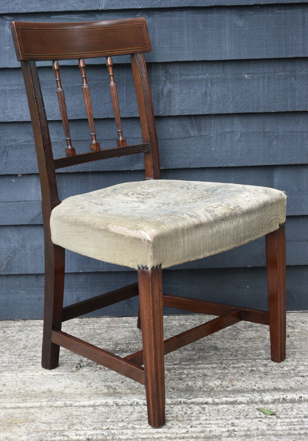 Set of six mahogany Georgian style dining chairs featuring spindle backrests, turned legs, and floral tapestry upholstery. View XI