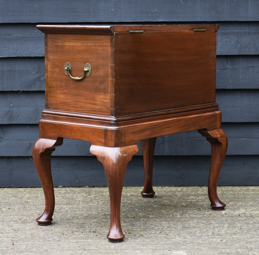 A 19th-century mahogany box on stand featuring cabriole legs, pad feet, brass side carrying handles, and a key with a pink tassel. View III