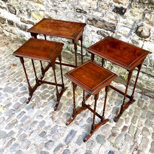 AN EDWARDIAN NEST OF FOUR TABLES - ADDITIONAL PHOTO 1