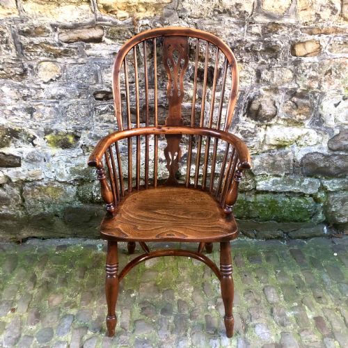 A MID VICTORIAN YEW WOOD WINDSOR CHAIR - ADDITIONAL PHOTO 1