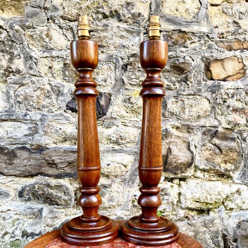 a pair of turned oak table lamps - CATEGORY: ANTIQUE LIGHTING - DATED 1930