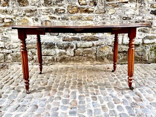 A WILLIAM IV MAHOGANY SMALL EXTENDING DINING TABLE - ADDITIONAL PHOTO 1