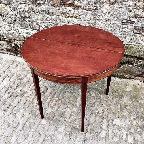 A GEORGE III MAHOGANY DEMILUNE TEA TABLE - ADDITIONAL PHOTO 5