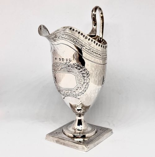 A GEORGE III SILVER HELMET CREAM JUG - ADDITIONAL PHOTO 2