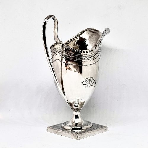 A GEORGE III SILVER HELMET CREAM JUG - ADDITIONAL PHOTO 3