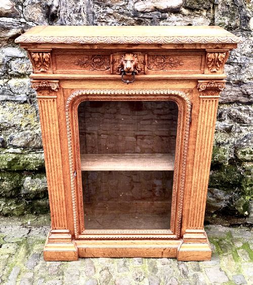 a victorian pale oak pedestal bookcase - CATEGORY: ANTIQUE BOOKCASES - DATED VICTORIAN