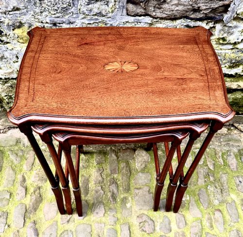 A LATE VICTORIAN MAHOGANY NEST OF THREE TABLES - ADDITIONAL PHOTO 1
