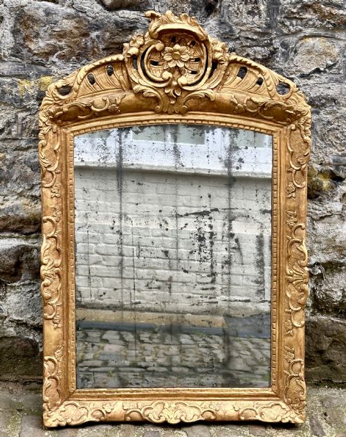 AN 18TH CENTURY ITALIAN GILTWOOD OVERMANTEL MIRROR - ADDITIONAL PHOTO 1