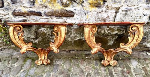 a pair of 18th century italian giltwood console tables - CATEGORY: ANTIQUE TABLES - DATED 18TH CENTURY