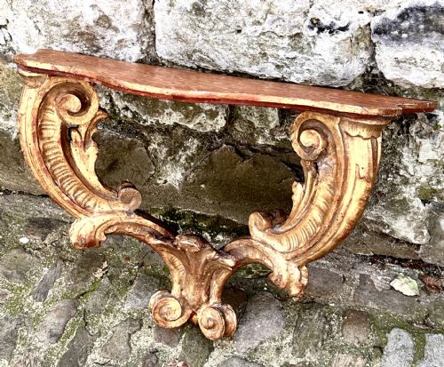 A PAIR OF 18TH CENTURY ITALIAN GILTWOOD CONSOLE TABLES - ADDITIONAL PHOTO 4