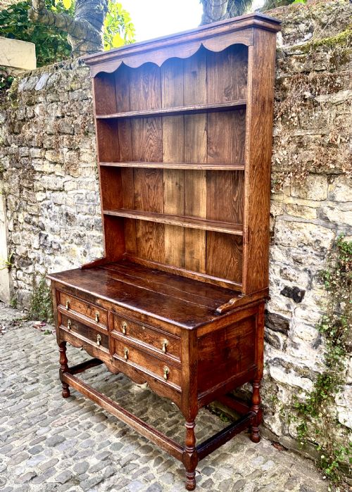 A GEORGE III OAK AND CHESTNUT DRESSER - ADDITIONAL PHOTO 2