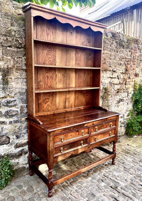 A GEORGE III OAK AND CHESTNUT DRESSER - ADDITIONAL PHOTO 3