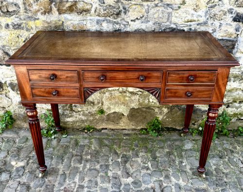 A GEORGE IV GILLOWS STYLE MAHOGANY WRITING TABLE