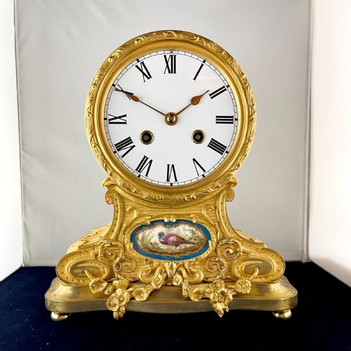 A LATE 19TH CENTURY GILT BRONZE 'DRUMHEAD' MANTEL CLOCK