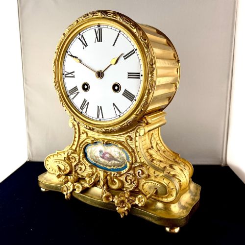 A LATE 19TH CENTURY GILT BRONZE 'DRUMHEAD' MANTEL CLOCK - ADDITIONAL PHOTO 1