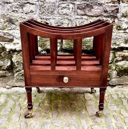 A GEORGE III MAHOGANY CANTERBURY