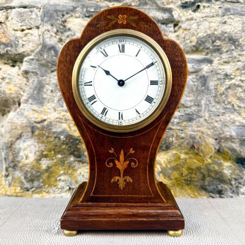 An Art Nouveau Mahogany Mantel Clock