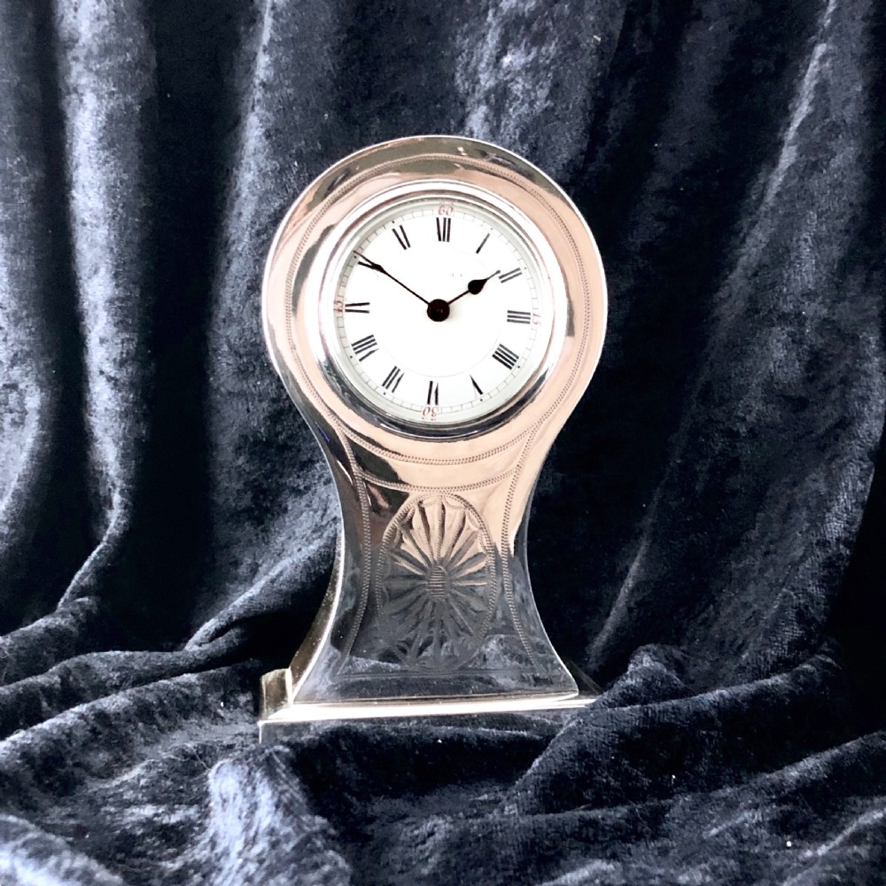 An Edwardian silver mantel clock 