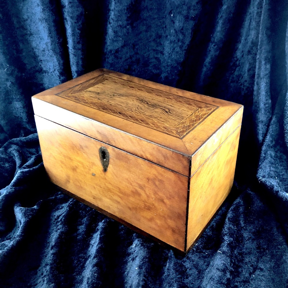 A George III satinwood tea caddy  View III
