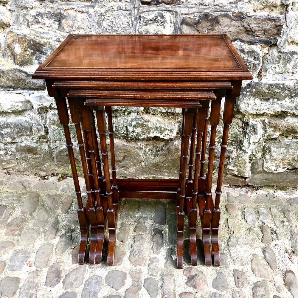 An Edwardian nest of four tables 