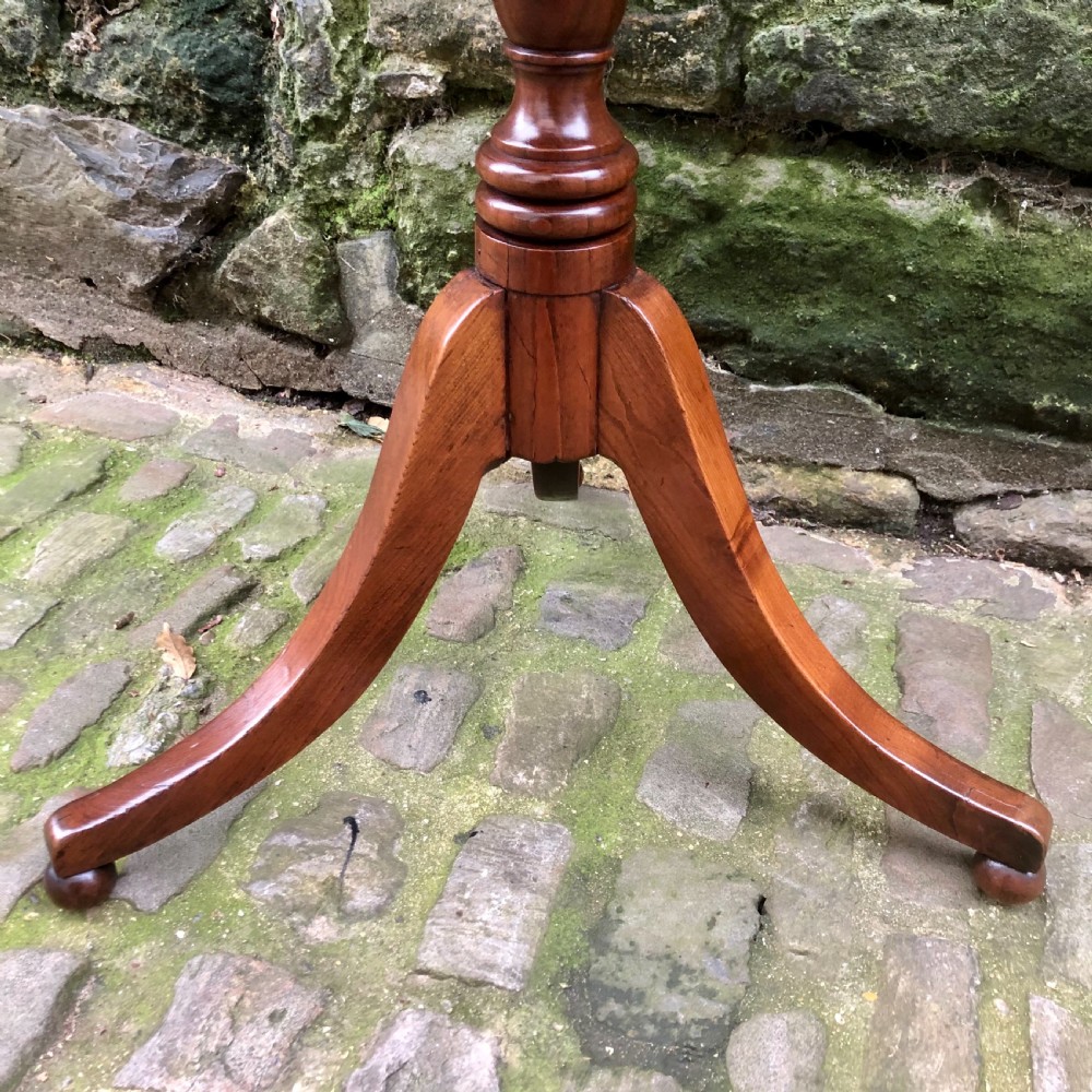 A George III mahogany and cherrywood wine table View IV
