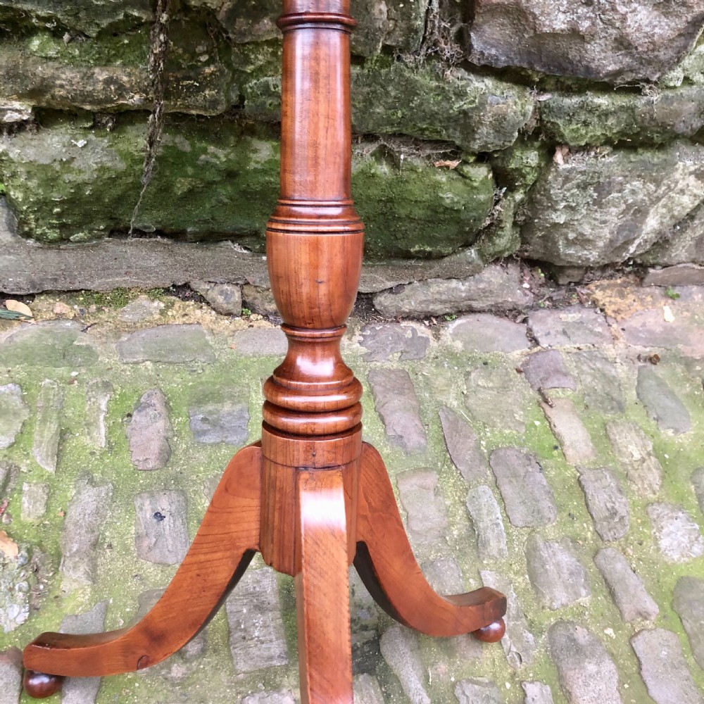 A George III mahogany and cherrywood wine table View VI