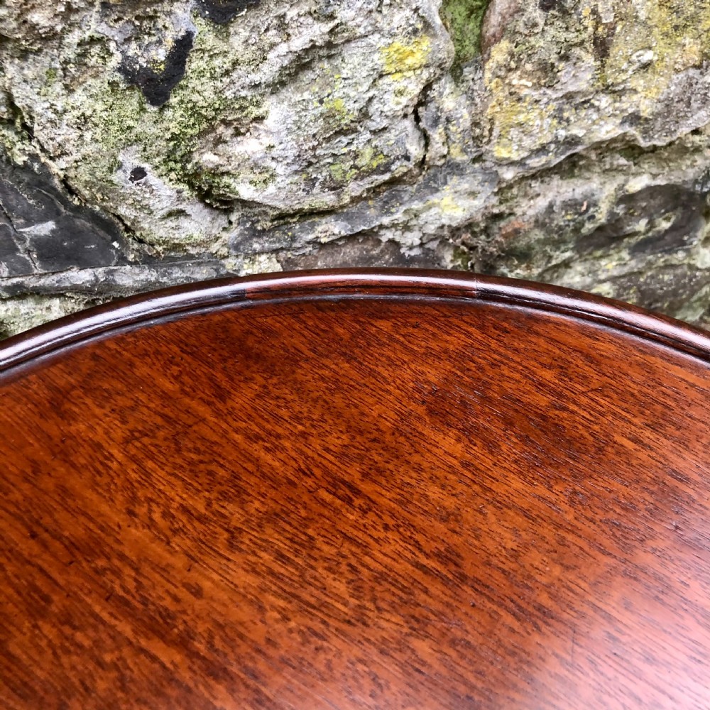 A George III mahogany and cherrywood wine table View VII
